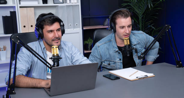 istock Host channel of smart influence broadcaster talking with guest. Sellable. 2148326017