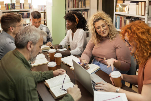 istock Group of Multiracial People With a Mixed Age Range in Library 2148326157