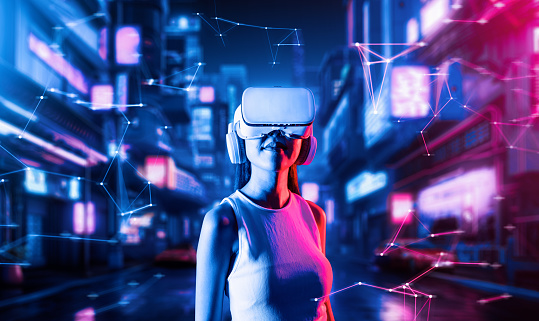Smart female stand in cyberpunk style building in meta wear VR headset connect metaverse, future cyberspace community technology. Woman confidently look faraway to virtual construction. Hallucination.