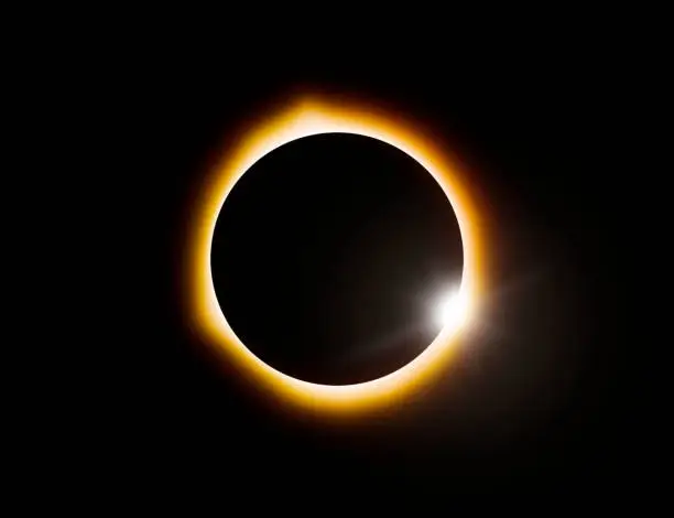 North American total solar eclipse of April 8 2024 in Montreal, Canada (digital enhancement with added photographic effects) “Diamond ring effect”