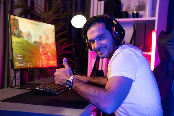 istock Smart gaming streamer enjoy playing battle team looking camera to pose. Surmise. 2148328225