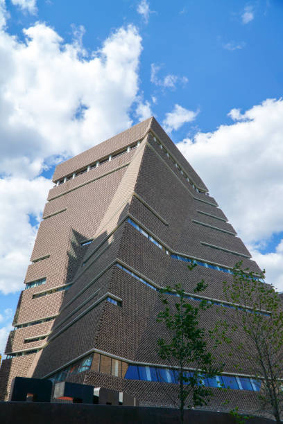 Partial view of a red brick house on a sunny day