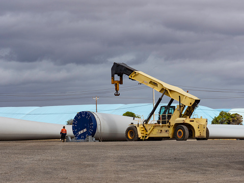 Wind turbine parts and crane being moved around, Geelong