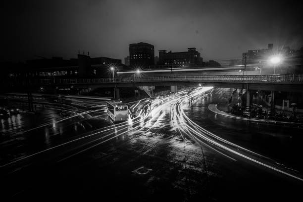 istock Cars speed through a busy intersection in downtown Shanghai 2148331702