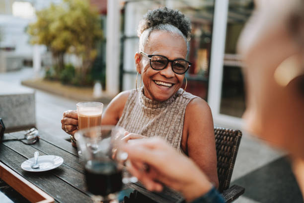 Two senior friends at the coffee