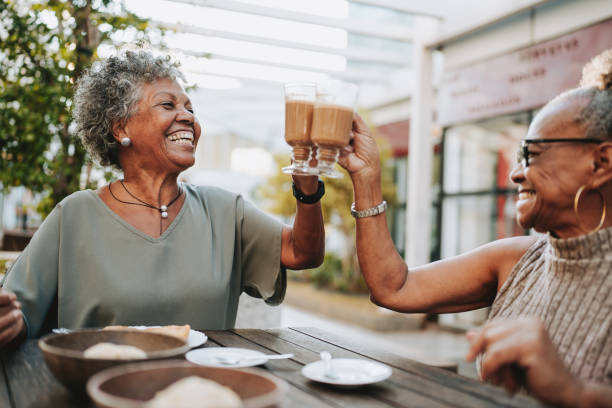 Two senior friends at the coffee