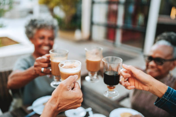 istock Group of senior friends toasting with coffee 2148331780