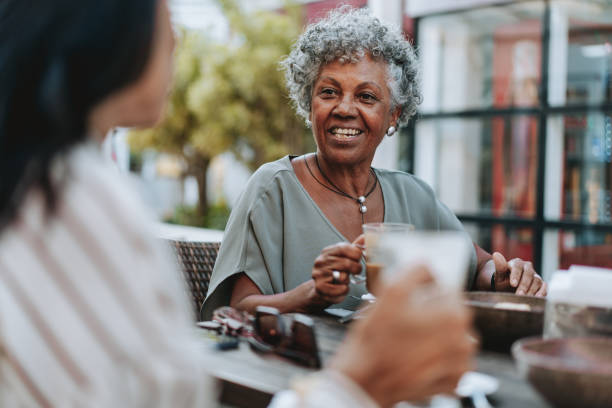 istock Two senior friends at the coffee 2148331796