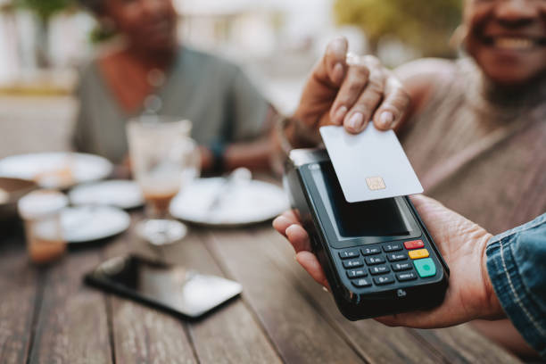istock Senior woman making credit card payment 2148331834