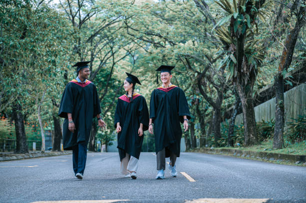 istock exciting Asian graduation  students walking to graduation hall 2148332256