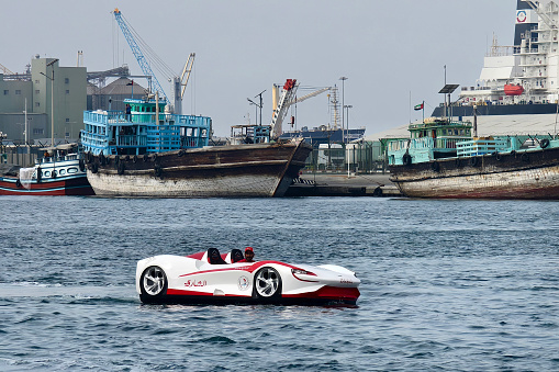 A boat in the shape of a car floats in the bay in Sharjah. United Arab Emirates, January 28, 2024.