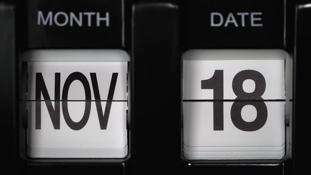 retro flip calendar with date change from seventeenth November to eighteenth November. close up.