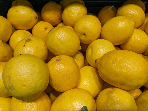 Fresh Lemons on Display at Grocery Store