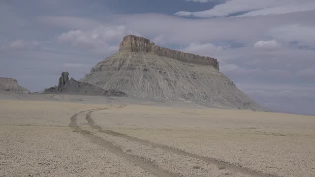Factory Butte is a summit in Wayne County, Utah, in the United States