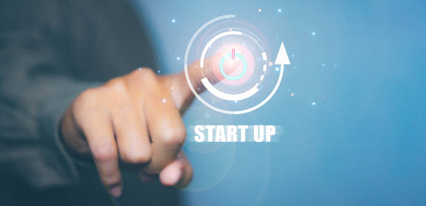 istock Businessman press button startup business. On button start in new business progress. Start up business concept. 2148344198