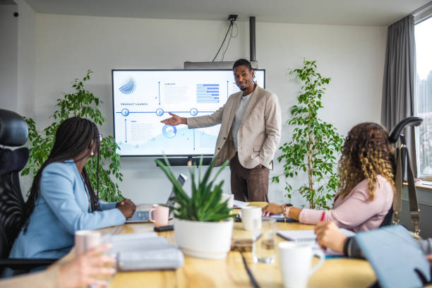 istock Diverse Team Engages in Strategic Analysis at Business Meeting 2148345169