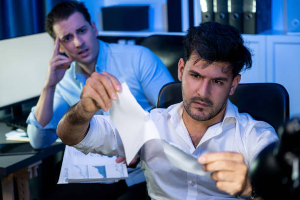 istock Colleagues with freaking out face for deadline project at night time. Sellable. 2148345947