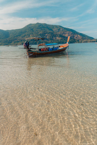 istock Wooden boat on the beach on the island 2148348675