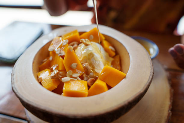 istock Mango yogurt on the table in a dessert shop 2148349181