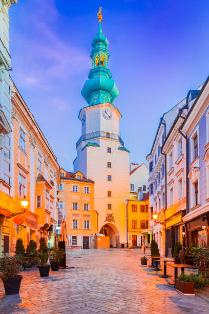 Bratislava, Slovakia. Michael's Gate tower, street in the Old Town Bratislava, Slovakia. Michael's gate Tower, old town of Bratislava (Pressburg), morning twilight. bratislava castle bratislava castle fort stock pictures, royalty-free photos & images