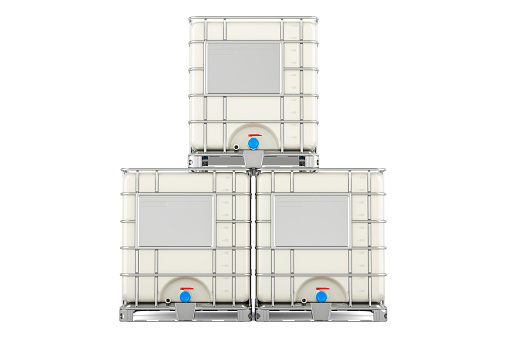 Stack of intermediate bulk containers, 3D rendering isolated on white background