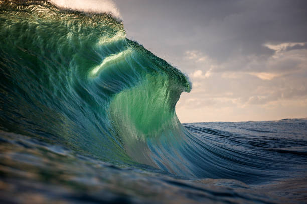 istock Beautiful aqua wave breaking over a shallow reef 2148353732