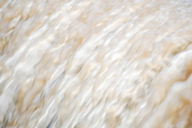 Splash Of Water Over Blue Background