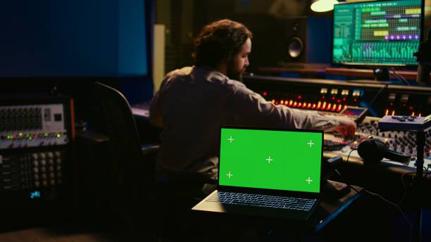 istock Music production engineer mixing and mastering music in control room 2148356396