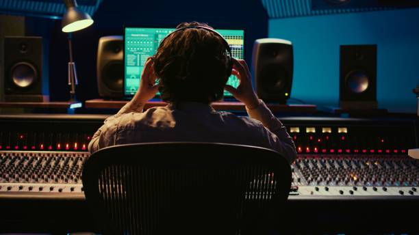 istock Sound designer working on track recording with audio professional software 2148356521
