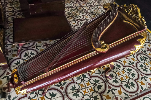 Jogja, Indonesia - January 31, 2024: Collection of Authentic Javanese Gamelan set belongs to Keraton Yogyakarta. Traditional music instruments in Sultan Palace, Jogja.