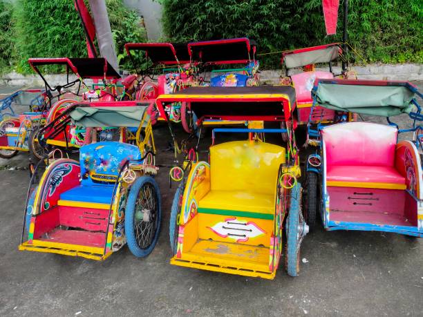 istock small colorful rickshaws for children to play. 2148356769