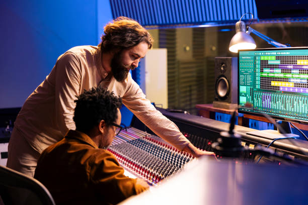 istock Diverse team of artist and audio engineer composing a hit song 2148356821