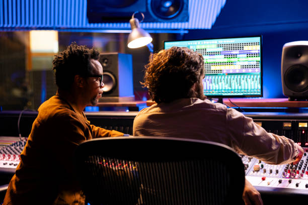istock Team of technical engineers working on recording and editing music 2148357079