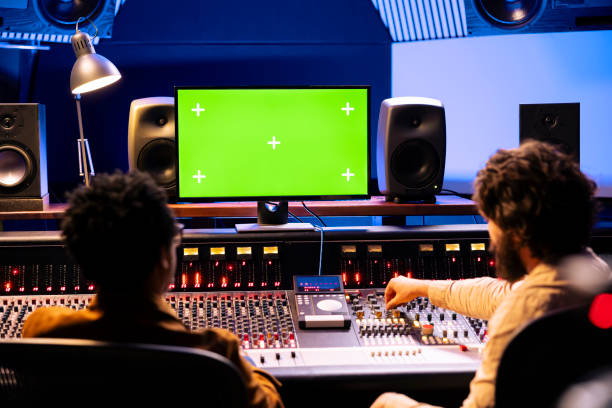 istock Team of specialists recording and editing tracks with isolated screen on pc 2148357280