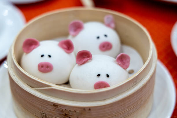 Pig-shaped Chinese red bean buns at restaurant