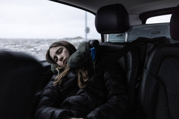istock Teen Sleeping in car 2148358524