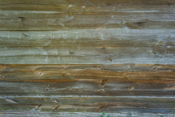 Wooden texture background. Wall of old wooden boards.Close-up,
