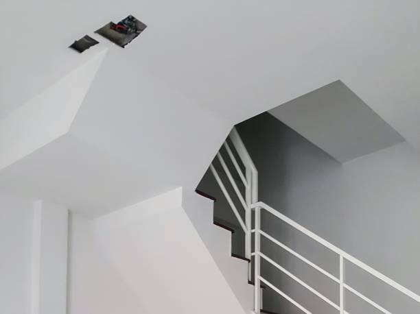 istock a photography of a staircase with a black and white railing. 2148360194