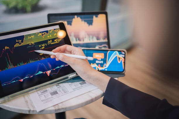 istock Gen Z using finance tech digital tablet technology A.I. to prediction possibility to risk / reward to making money trading robot trade in crypto-stockmarket 2148360424