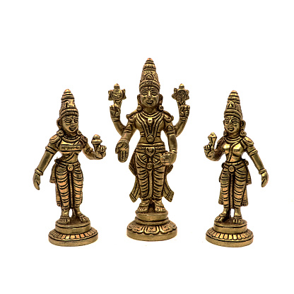 handcrafted antique figure of god vishnu of hindu religion with devi or angels of heaven isolated in a white backgroud
