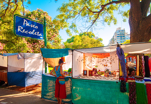 Argentinian Artistry: Street Stall Showcasing Local Crafts in the Heart of Buenos Aires, Inviting Passersby to Explore the Vibrant Culture and Rich Tradition of Argentine Artisanal Goods.