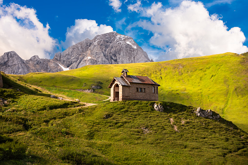 Little church or chappel in Dolomite alps in summer