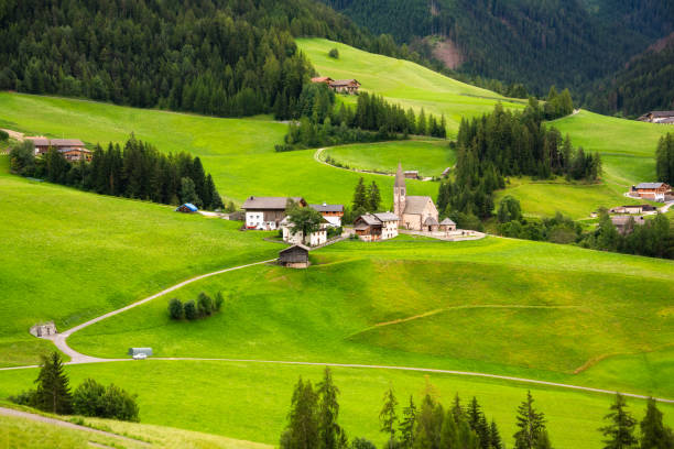 istock Green valley in Dolomite alps with a small village 2148362337