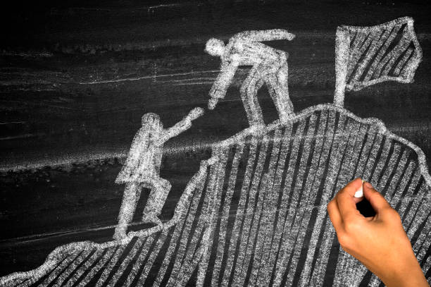 istock Business people climb the mountain 2148362500