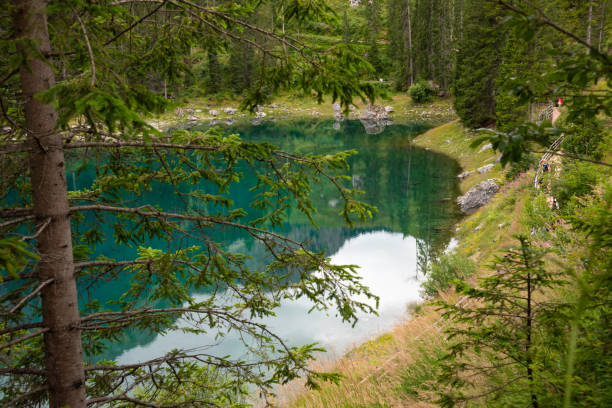 istock Carezza lake surrounded by forest and mountains in Dolomite alps, Italy 2148362558
