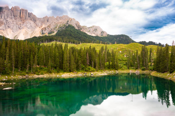 istock Carezza lake surrounded by forest and mountains in Dolomite alps, Italy 2148362574