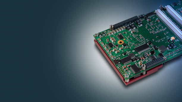 istock Close-up of an embedded CPU module with integrated chips and connectors, isolated on a colour gradient background with copy space. 2148363396