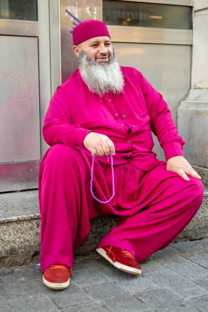 Face of happy mature bearded muslim man