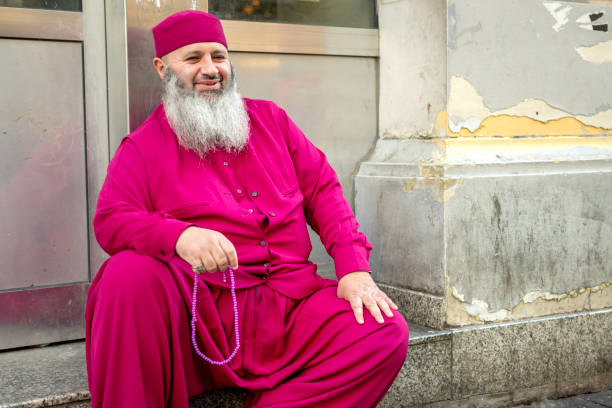 Face of happy mature bearded muslim man