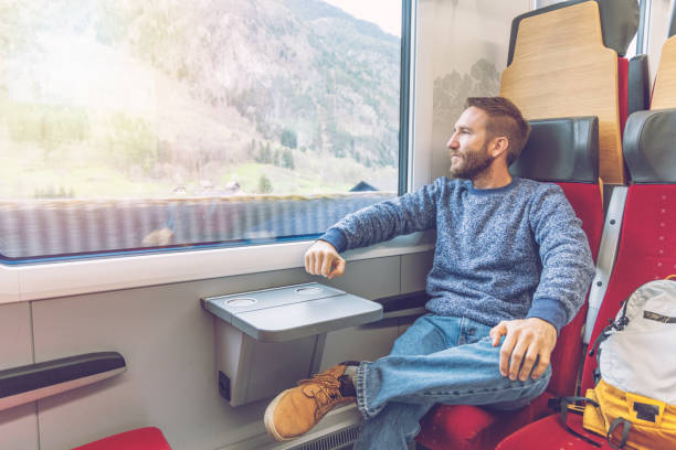 istock Male commuter relaxing on a train 2148365723